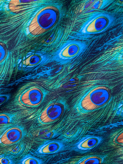 Peacock design print of great quality of nylon spandex 4-way stretch 58/60” Sold by the YD. Ships worldwide from Los Angeles California USA.