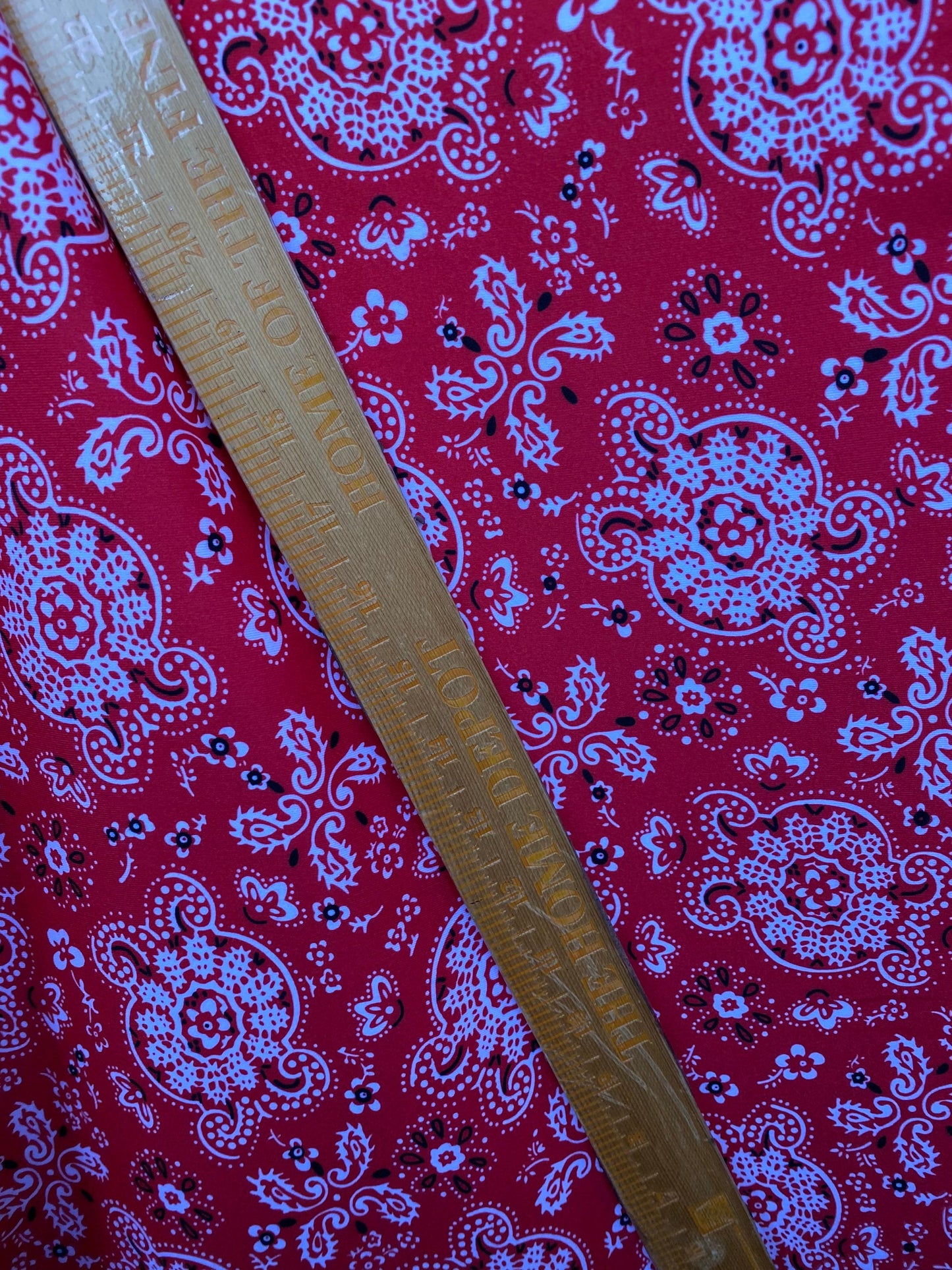 Red bandana design print on great quality of brushed poly spandex 4-way stretch medium weight 58/60” Sold by the YD.