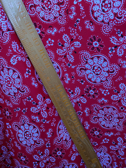 Red bandana design print on great quality of brushed poly spandex 4-way stretch medium weight 58/60” Sold by the YD.
