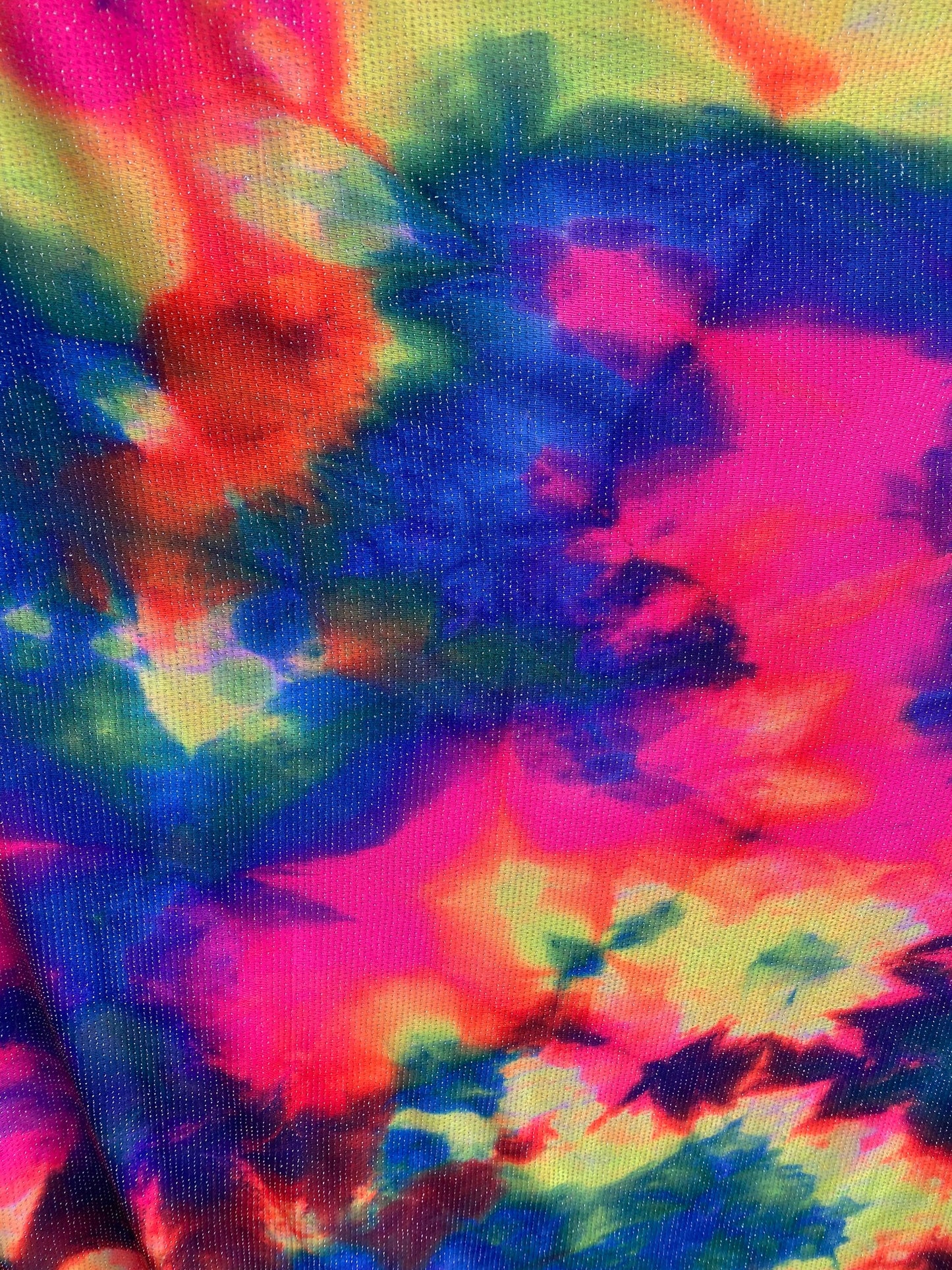 New tie dye print on poly spandex with lurex medium weight 4-way stretch 58/60” Sold by the YD. Ships worldwide from Los Angeles California