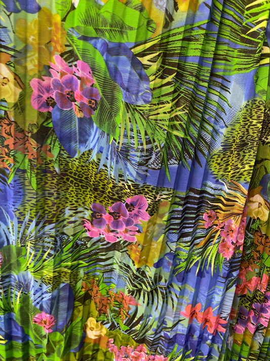 New Hiding Exotic Leopard design print on pleated power mesh 4-way stretch 58/60” Sold by the YD. Ships worldwide from Los Angeles CA USA.
