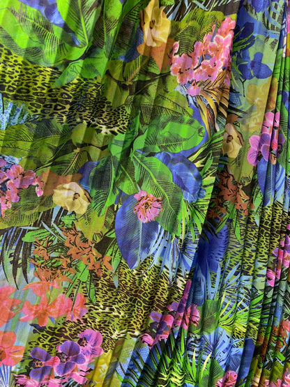 New Hiding Exotic Leopard design print on pleated power mesh 4-way stretch 58/60” Sold by the YD. Ships worldwide from Los Angeles CA USA.
