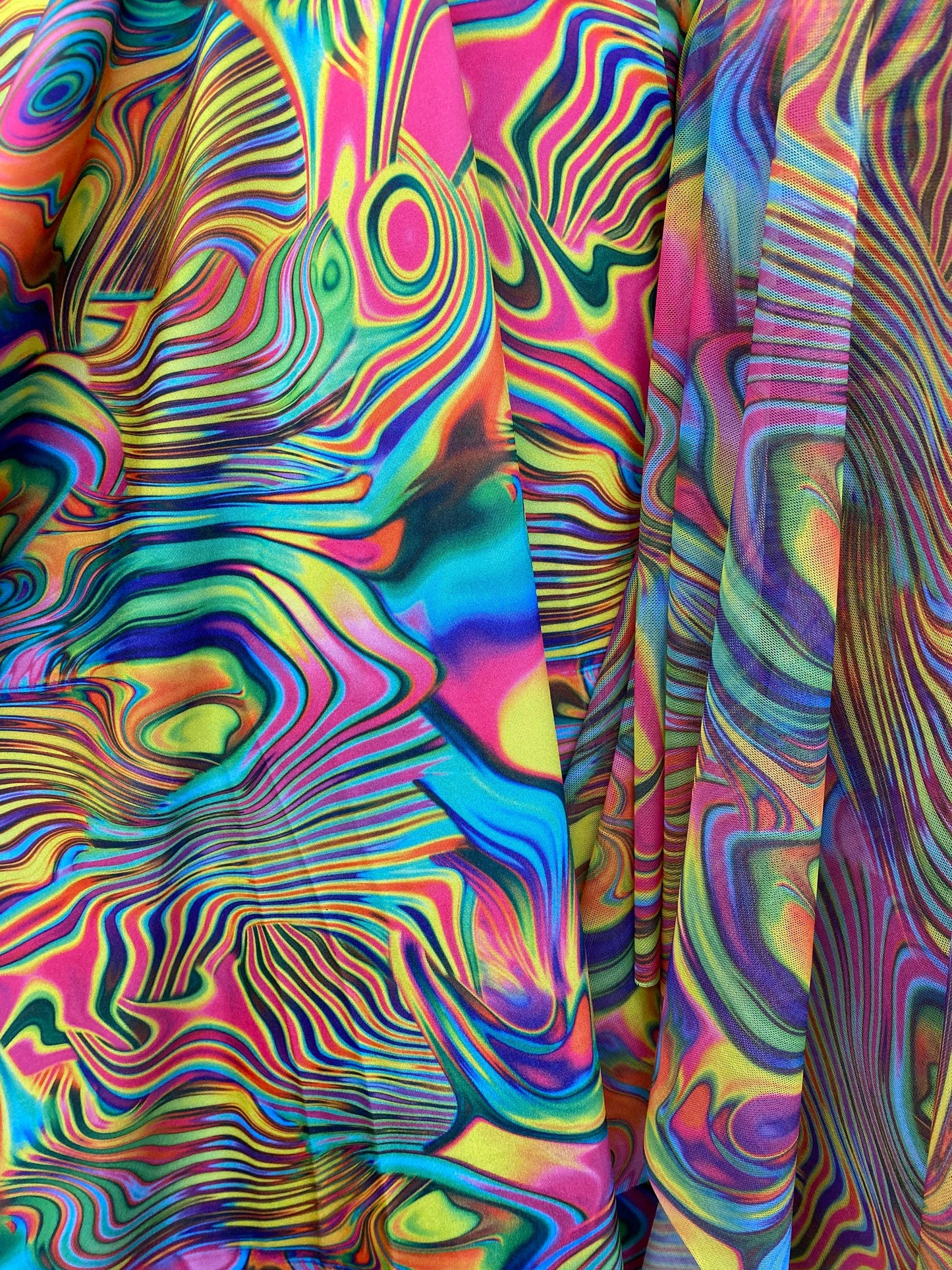 New modern abstract design print on great quality of nylon spandex and power mesh 4-way stretch 58/60” Sold by the YD.