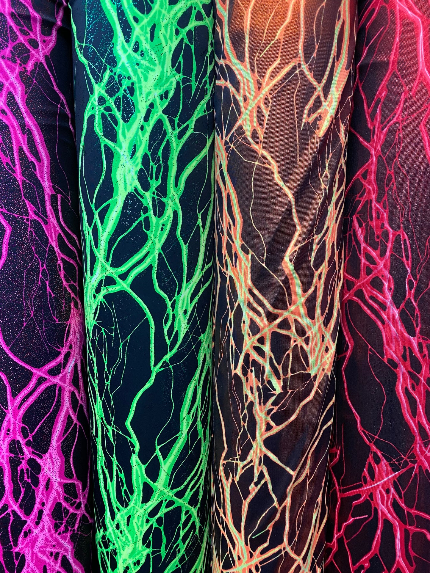 Thunder design print on great quality of nylon spandex with foggy foil 4-way spandex 4-way stretch 58/60” Sold by the YD. Ships worldwide