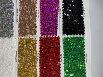 New Cosmic glitz sequins embroidered holographic micro sequins on solid spandex 4-way stretch 54/55” Sold by the YD.