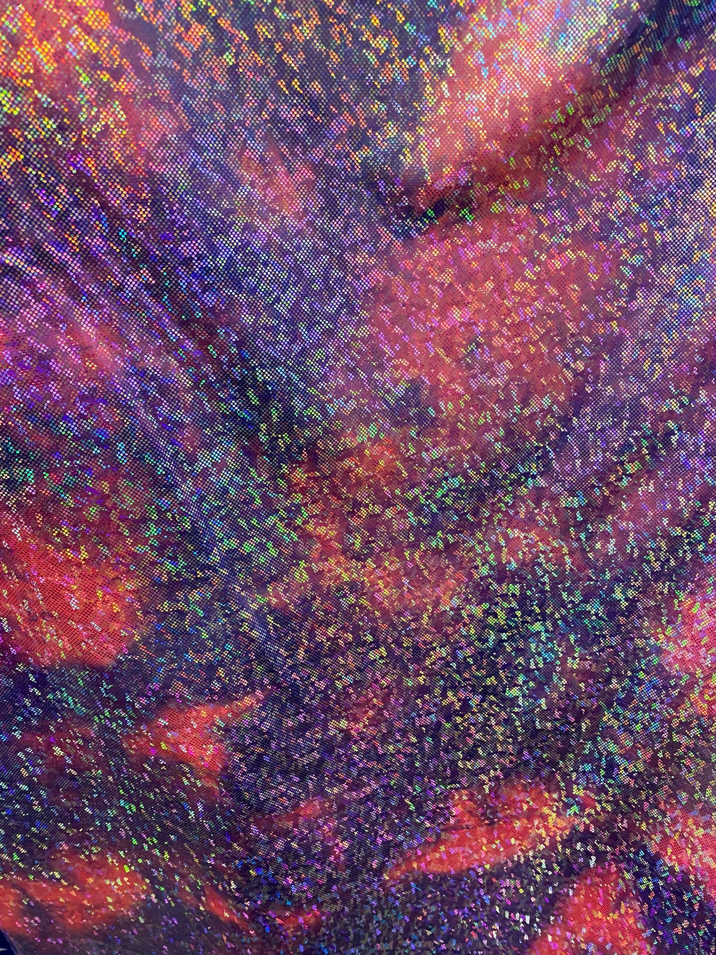 New tie dye cotton candy shattered glass metallic nylon spandex with hologram foil 4-way stretch 58/60” Sold by the YD.