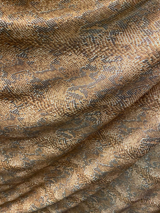 New exotic snake design metallic hologram poly spandex bronce color médium weight 2-way Stretch 58/60" Sold by the YD. Ships worldwide