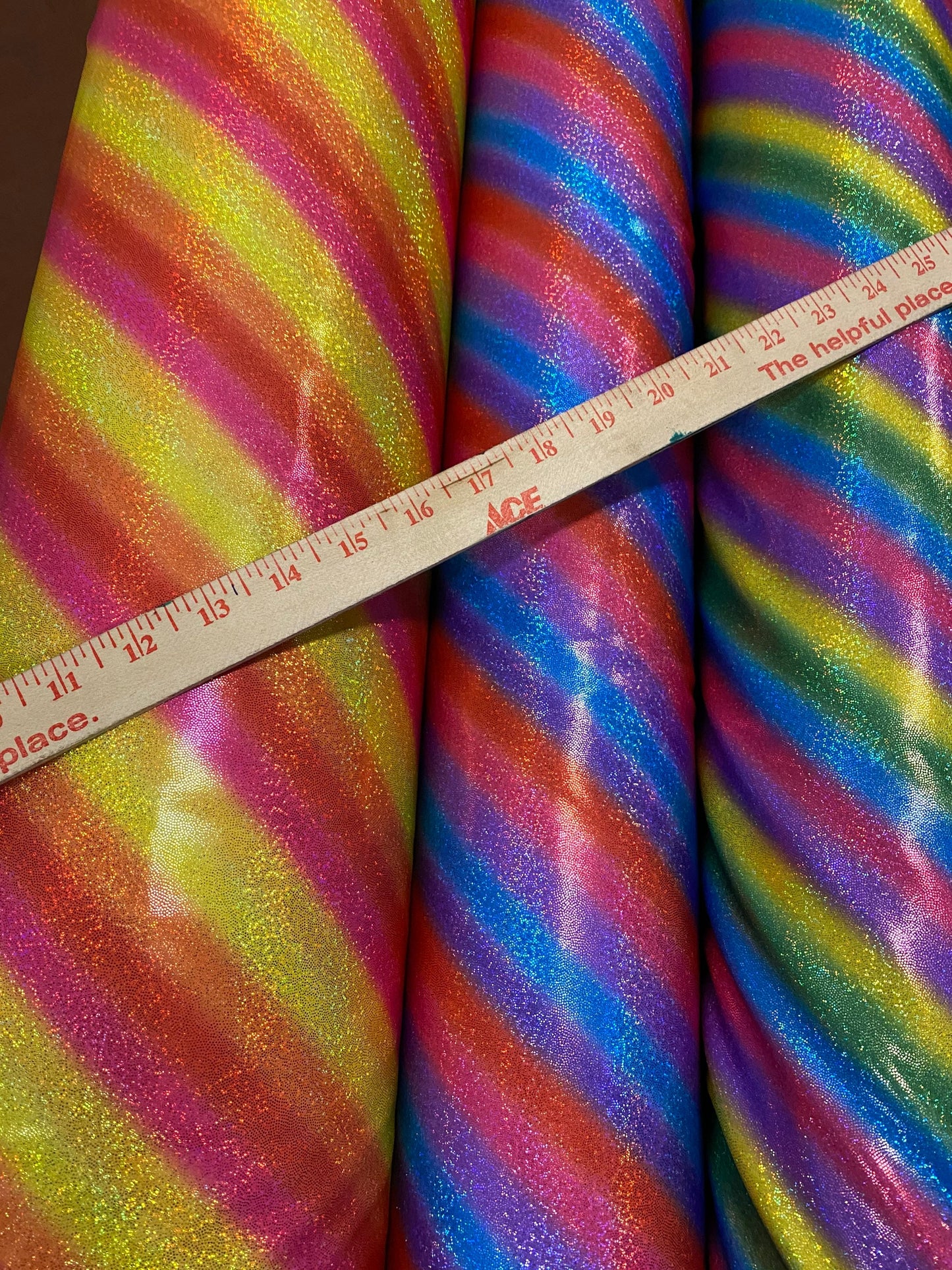 New Luxury rainbow with foggy hologram foil metallic nylon spandex 4-way stretch 58/60” Sold by the YD. Ships worldwide from L.A