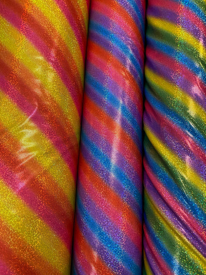 New Luxury rainbow with foggy hologram foil metallic nylon spandex 4-way stretch 58/60” Sold by the YD. Ships worldwide from L.A