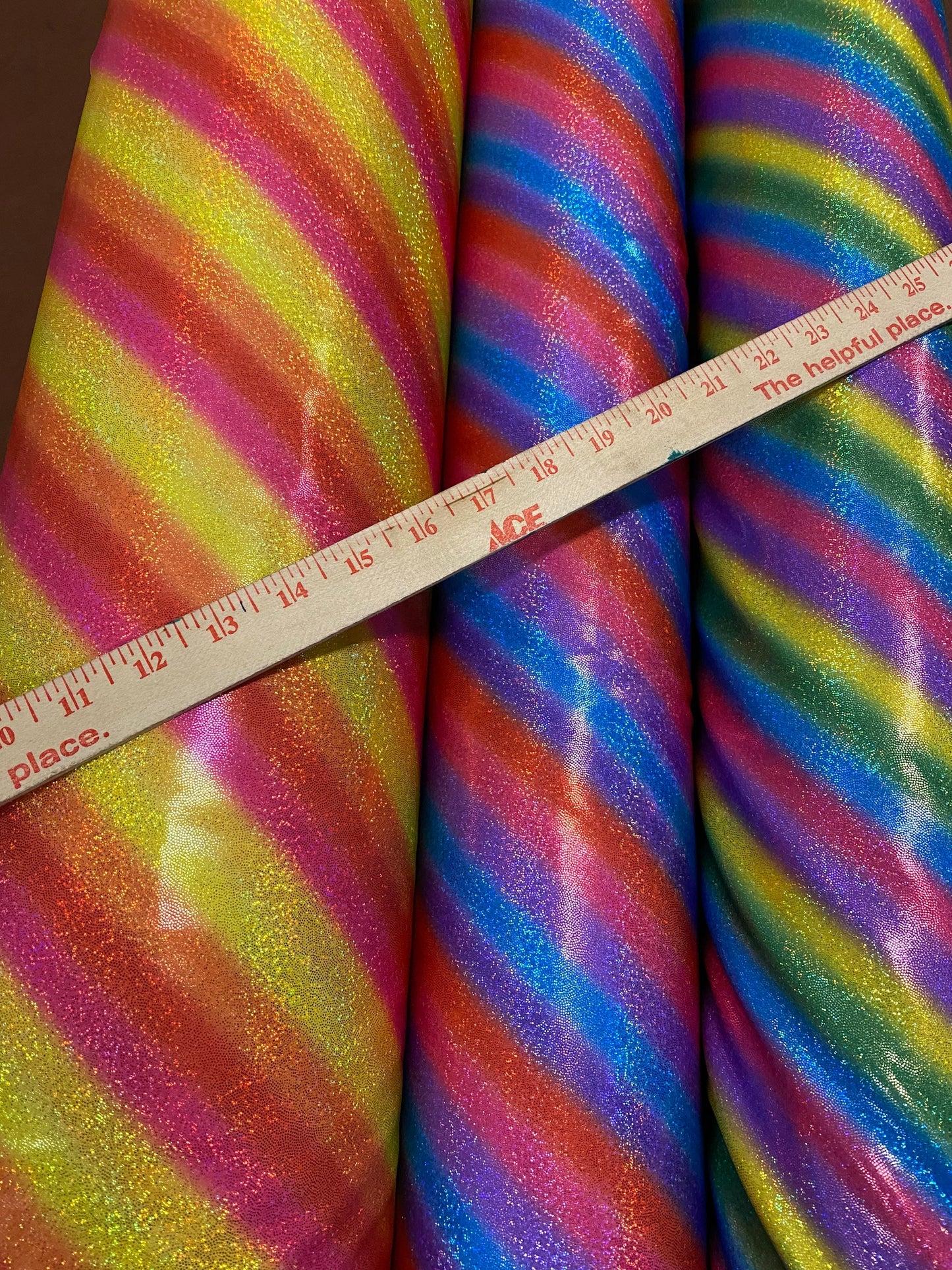 New Luxury rainbow with foggy hologram foil metallic nylon spandex 4-way stretch 58/60” Sold by the YD. Ships worldwide from L.A