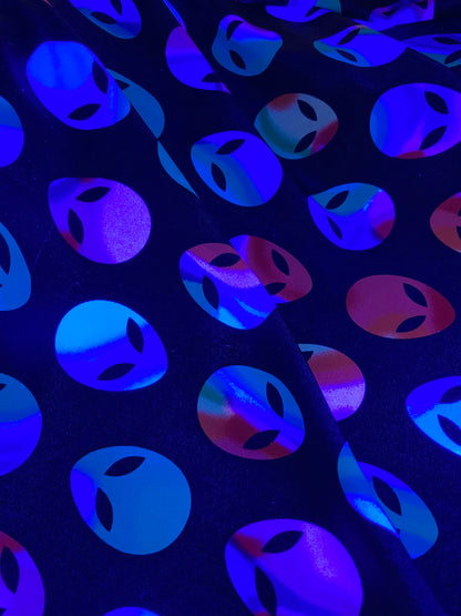 Nylon spandex Alien design it glows in the dark 4way stretch 58/60" sold by the yd. Ships worldwide from Los Angeles California USA