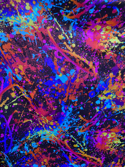 Graffiti paint design multi nylon spandex with foil 4-way stretch 58/60” sold by the YD. Ships worldwide from Los Angeles California.