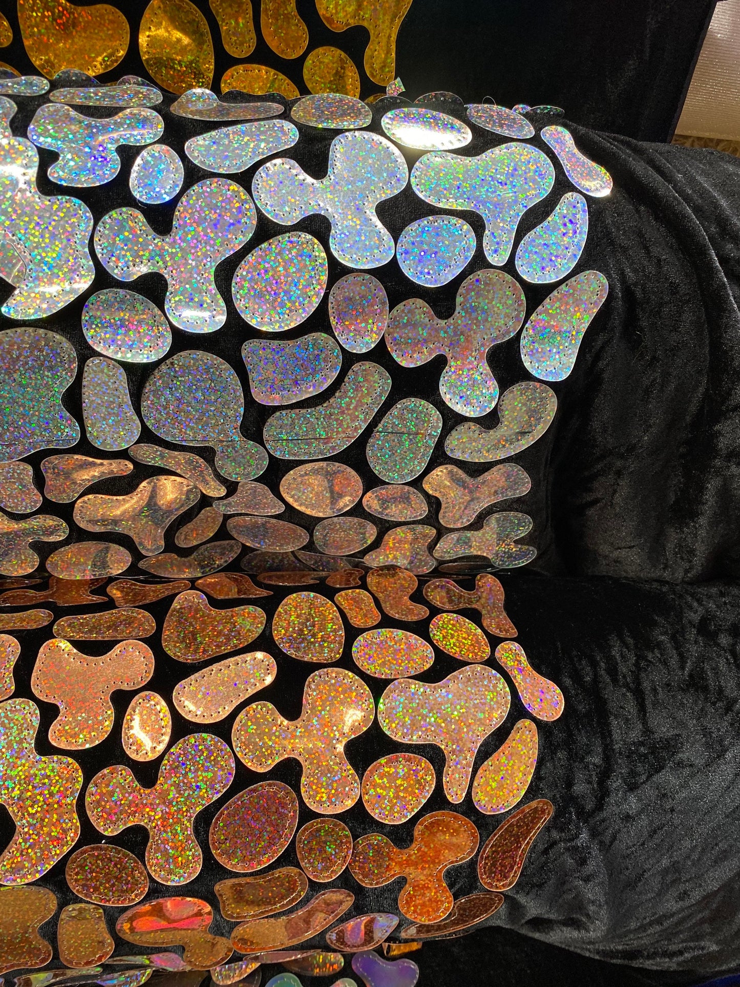New Stone pebbles design hologram geometric jumbo sequins embroidered on stretch velvet 2-way stretch 54/55” sold by the YD.