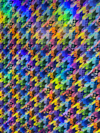 New modern houndstooth rainbow design digital foil print lacer hologram metallic nylon spandex 4-way stretch 58/60” Sold by the YD.