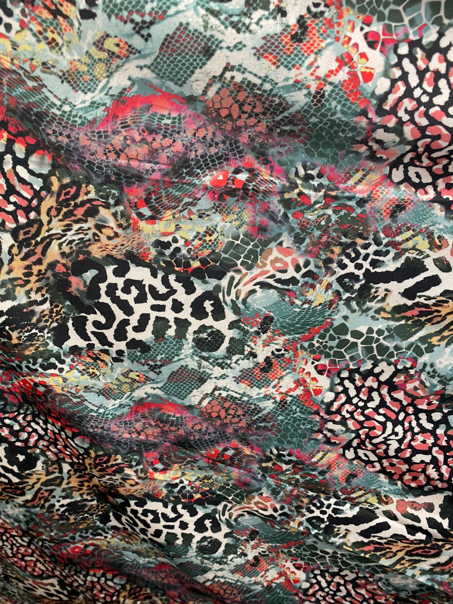 New Exotic animal print design great quality of nylon spandex 4-way stretch 58/60” Sold by the YD. Ships worldwide from Los Angeles cali.