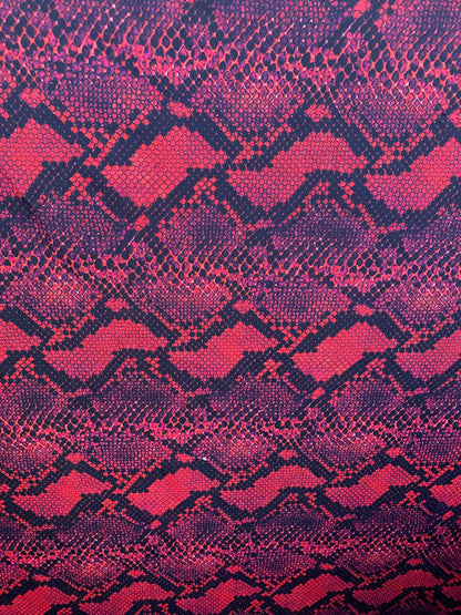 Serpent design Red/black print on nylon spandex 4-way stretch 58/60” Sold  by the YD. Ships worldwide from Los Angeles California USA.