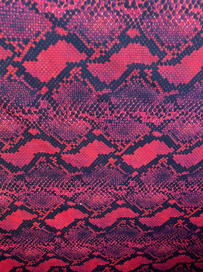 Serpent design Red/black print on nylon spandex 4-way stretch 58/60” Sold  by the YD. Ships worldwide from Los Angeles California USA.