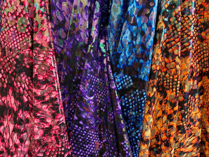 Iridescent metallic nylon spandex Cobra design 4way stretch 58/60” Sold by the YD. Ships worldwide from Los Angeles California USA