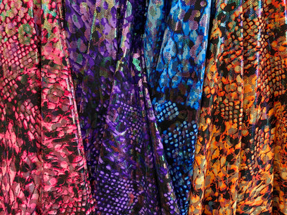 Iridescent metallic nylon spandex Cobra design 4way stretch 58/60” Sold by the YD. Ships worldwide from Los Angeles California USA