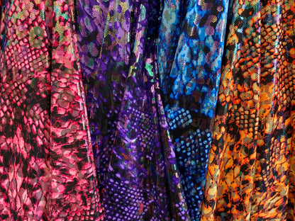Iridescent metallic nylon spandex Cobra design 4way stretch 58/60” Sold by the YD. Ships worldwide from Los Angeles California USA