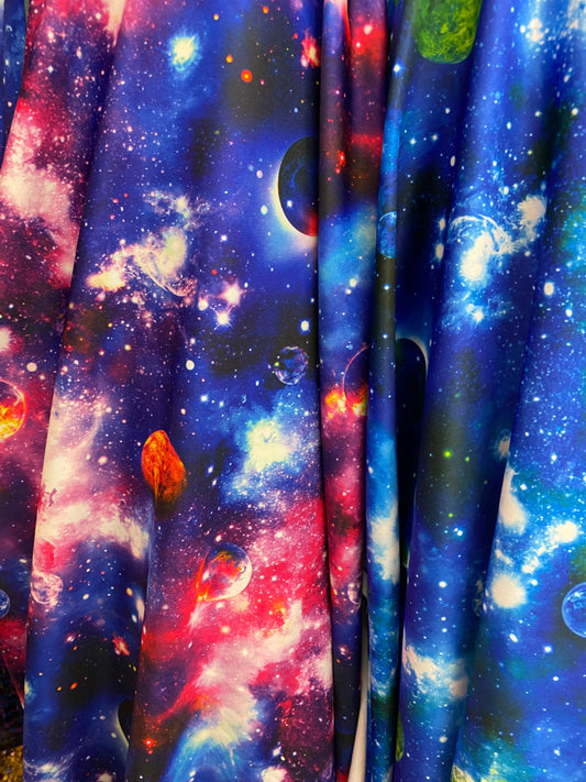 Amazing galaxy design print on heavy nylon spandex 4-way stretch 58/60” Sold by the YD. Ships worldwide from Los Angeles California USA.