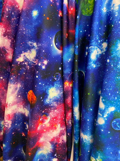 Amazing galaxy design print on heavy nylon spandex 4-way stretch 58/60” Sold by the YD. Ships worldwide from Los Angeles California USA.