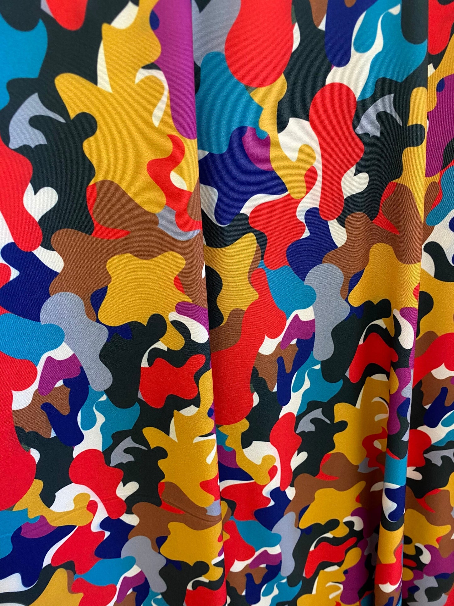 New camouflage multicolor print on nylon spandex 4-way stretch 58/60” Sold by the YD. Ships worldwide from Los Ángeles California USA.