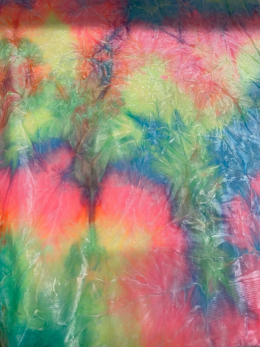 New tie dye stretch crushed velvet 4way Stretch multi pastel colors 58/60” Sold by the YD. Ships worldwide feom Los Angeles California USA.