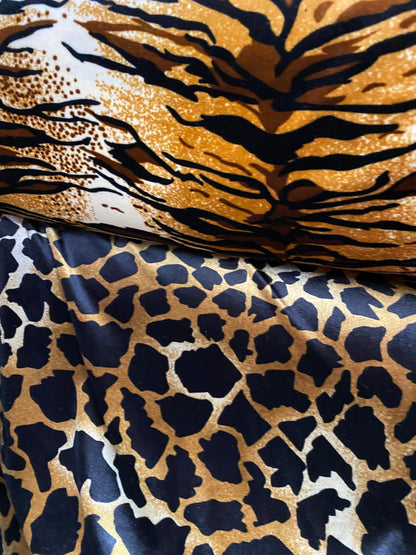 New exotic animal print on stretch velvet medium weight 4-way stretch 420 gsm 58/60” Sold by the YD. Ships worldwide from Los Angeles