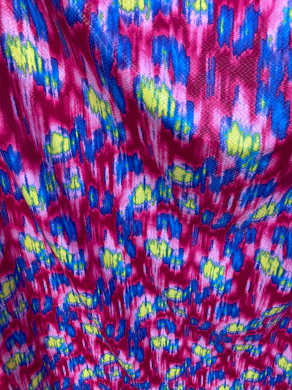 New Lava design with snake skin clear foil grate quality of poly spandex medium weight 2-way stretch 58/60” Sold by the YD.