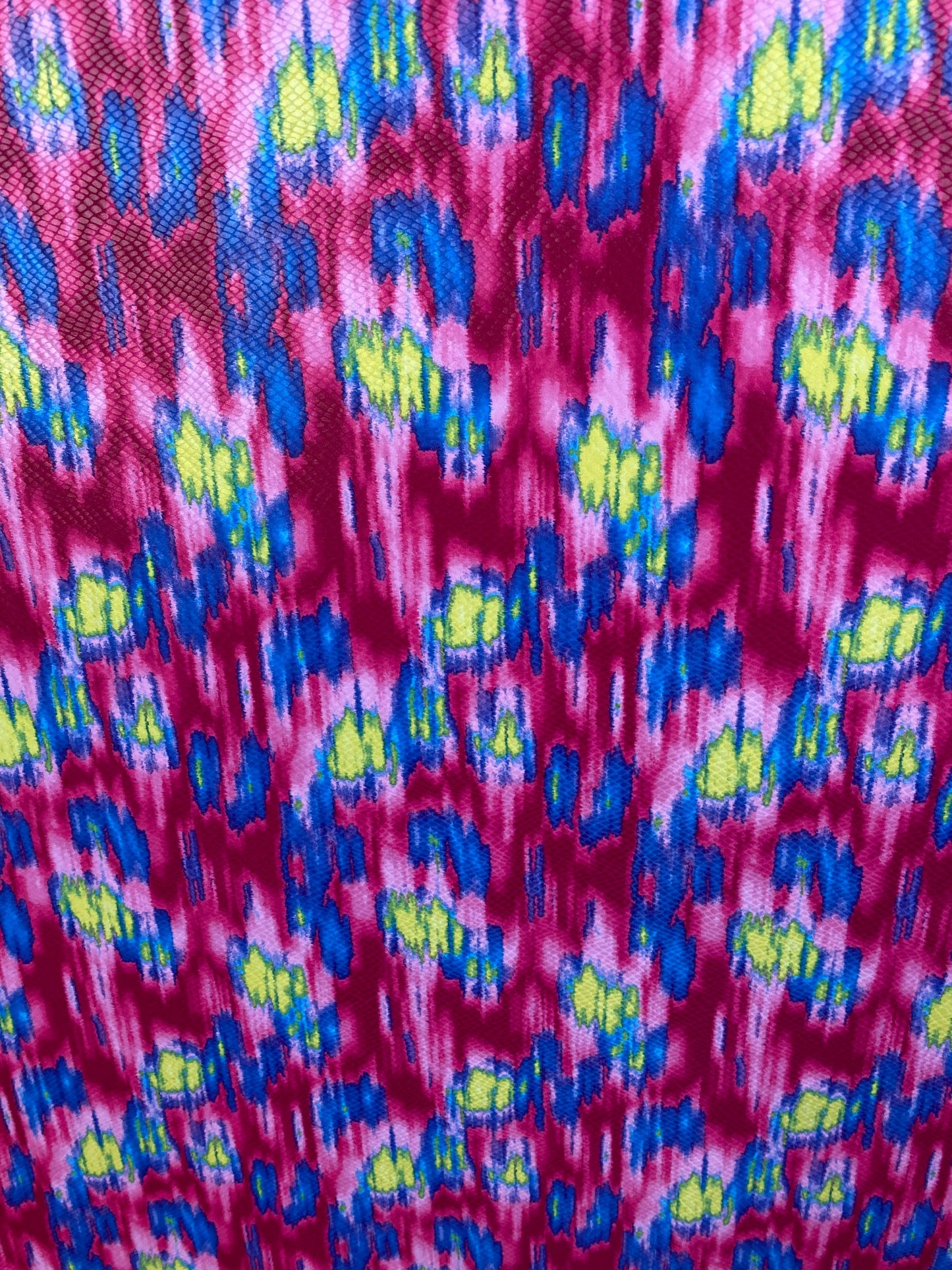 New Lava design with snake skin clear foil grate quality of poly spandex medium weight 2-way stretch 58/60” Sold by the YD.