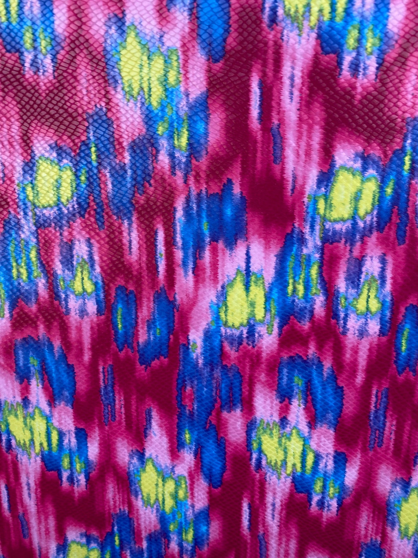 New Lava design with snake skin clear foil grate quality of poly spandex medium weight 2-way stretch 58/60” Sold by the YD.