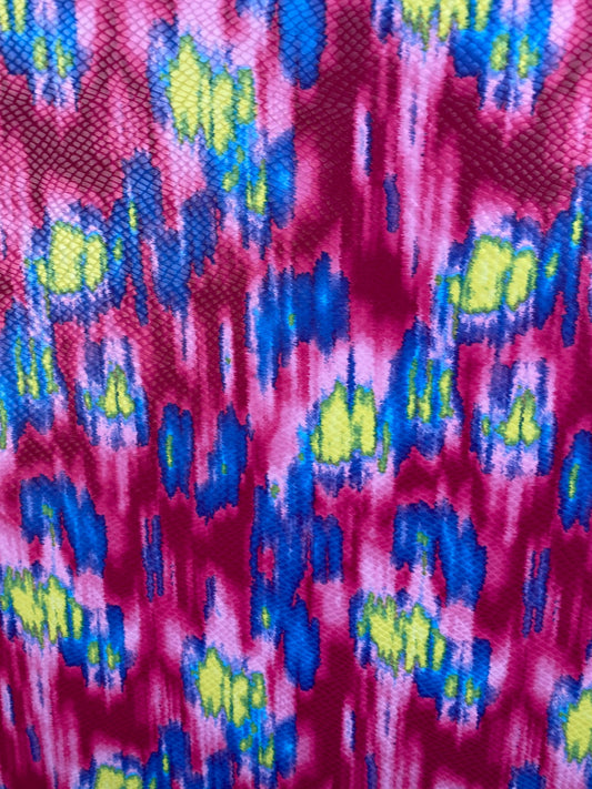 New Lava design with snake skin clear foil grate quality of poly spandex medium weight 2-way stretch 58/60” Sold by the YD.