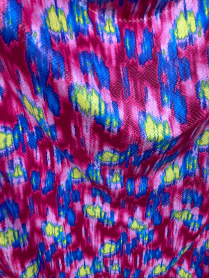 New Lava design with snake skin clear foil grate quality of poly spandex medium weight 2-way stretch 58/60” Sold by the YD.