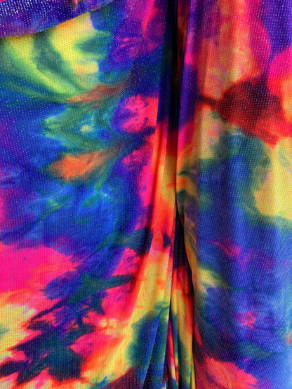 New tie dye print on poly spandex with lurex medium weight 4-way stretch 58/60” Sold by the YD. Ships worldwide from Los Angeles California