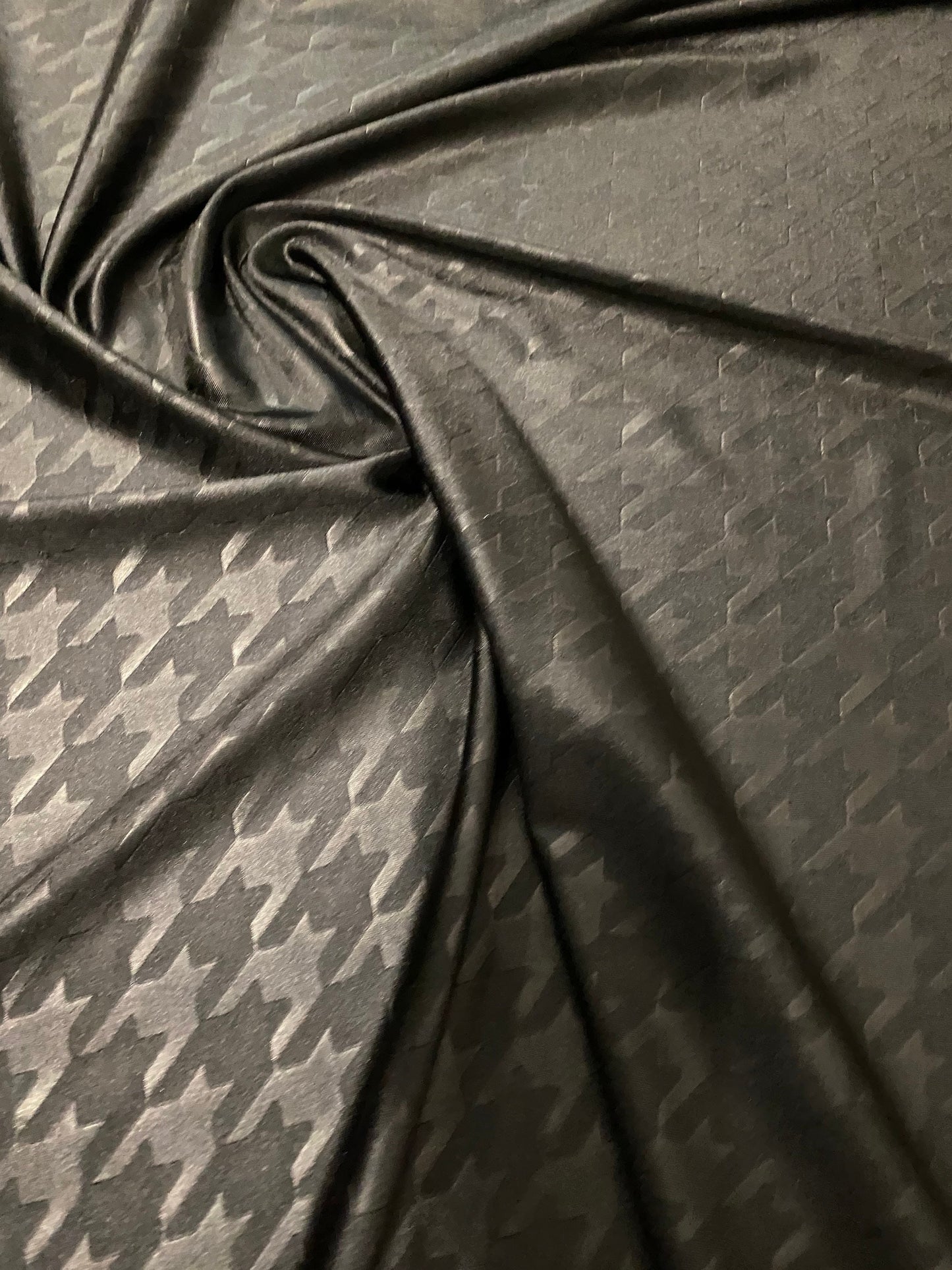 Houndstooth jumbo embossed great quality of nylon spandex 4-way stretch 58/60” Sold by the YD. Ships worldwide from Los Angeles California