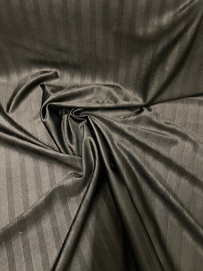 Stripes jumbo embossed great quality of nylon spandex 4-way stretch 58/60” Sold by the YD. Ships worldwide from Los Angeles California USA.