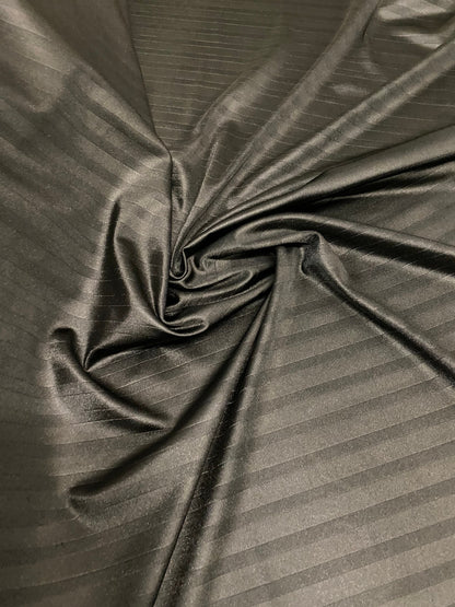 Stripes jumbo embossed great quality of nylon spandex 4-way stretch 58/60” Sold by the YD. Ships worldwide from Los Angeles California USA.