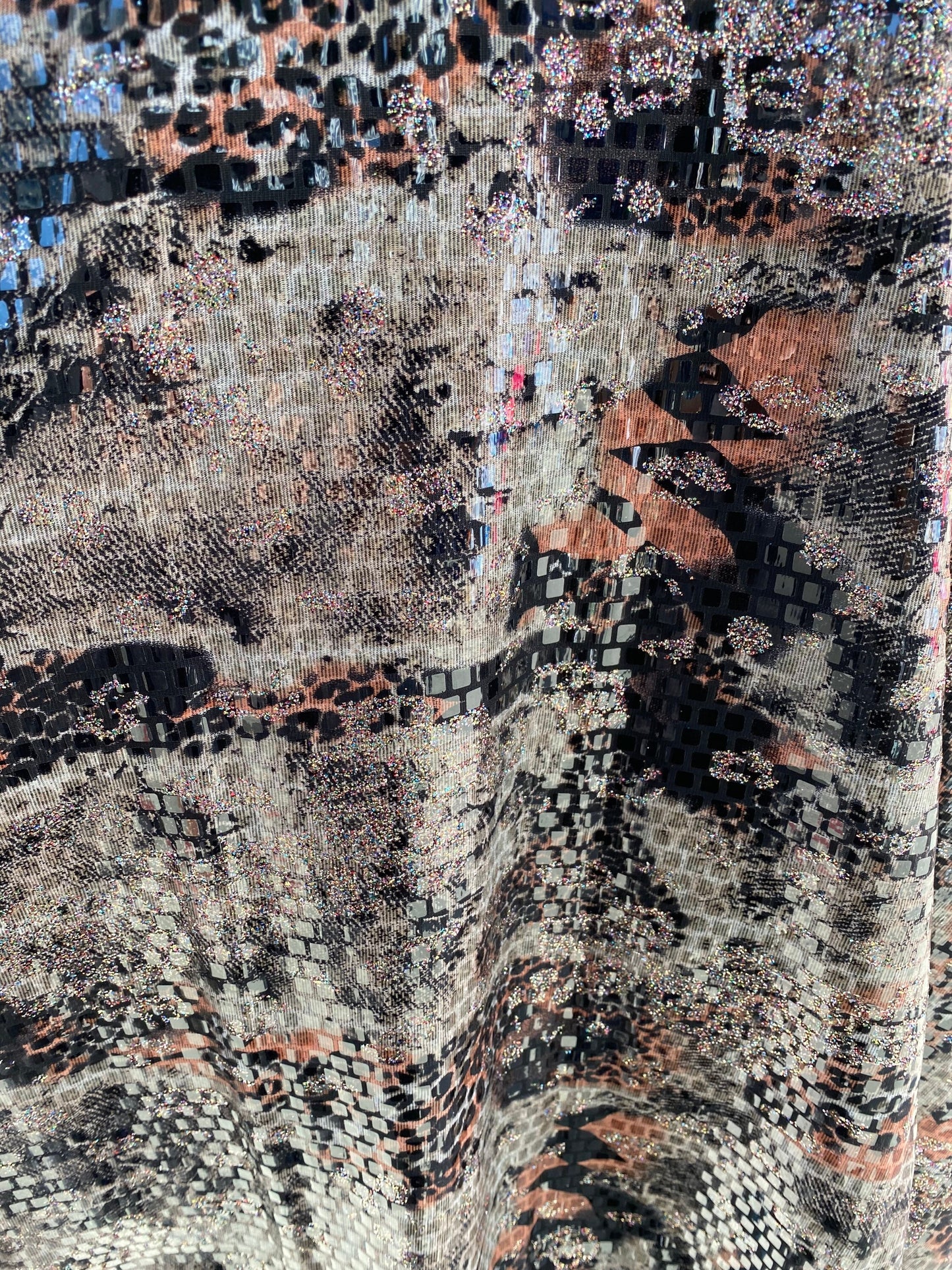 New abstract design print on poly spandex 2-way stretch with clear square sequins all over 58/60” Sold by the YD. Ships worldwide from L.A