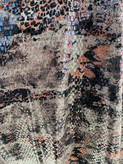 New abstract design print on poly spandex 2-way stretch with clear square sequins all over 58/60” Sold by the YD. Ships worldwide from L.A