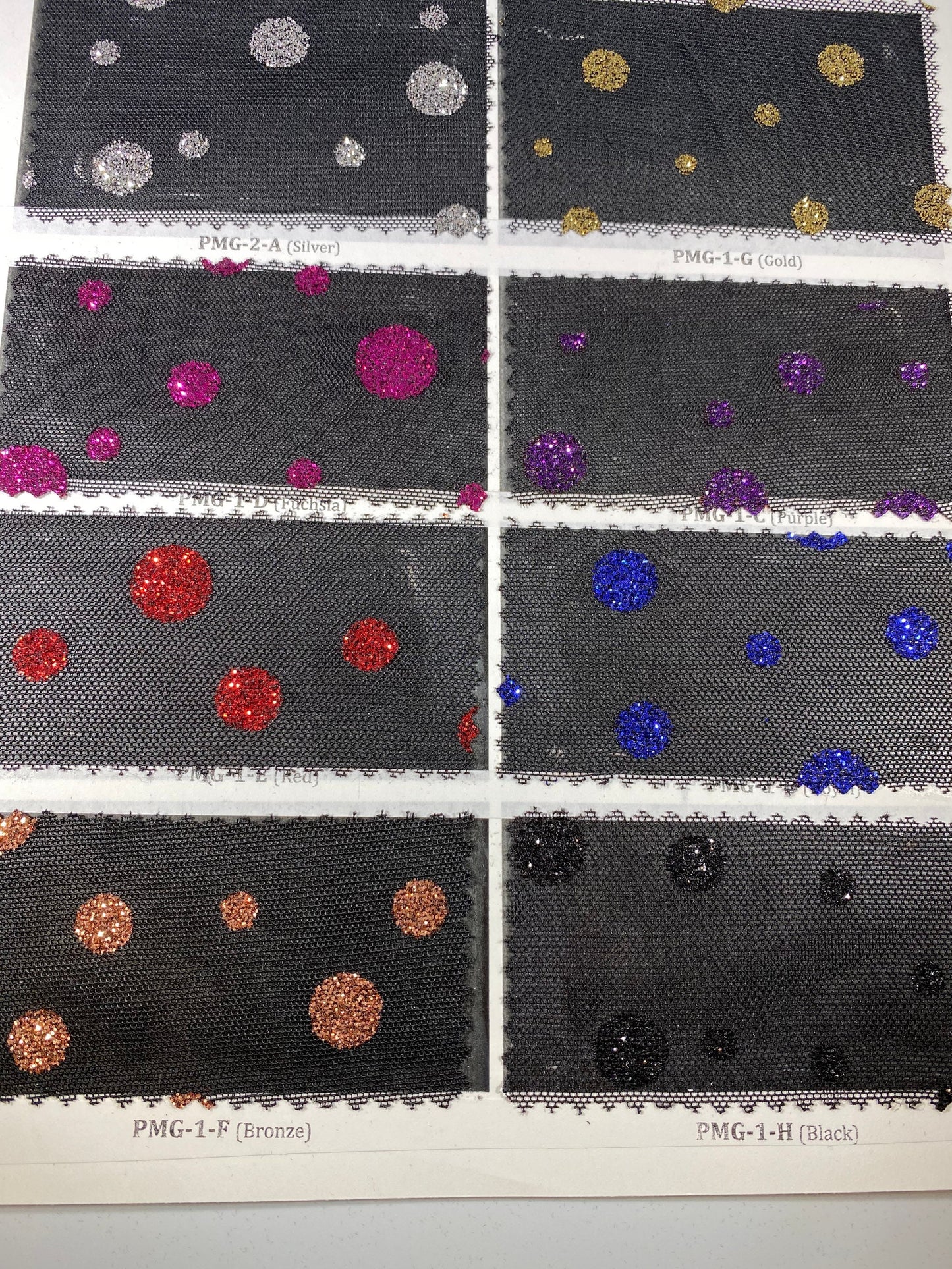 New Glitter polka dots design on black power mesh 2-way stretch 58/60” Sold by the YD. Ships Worldwide from Los Angeles California USA.