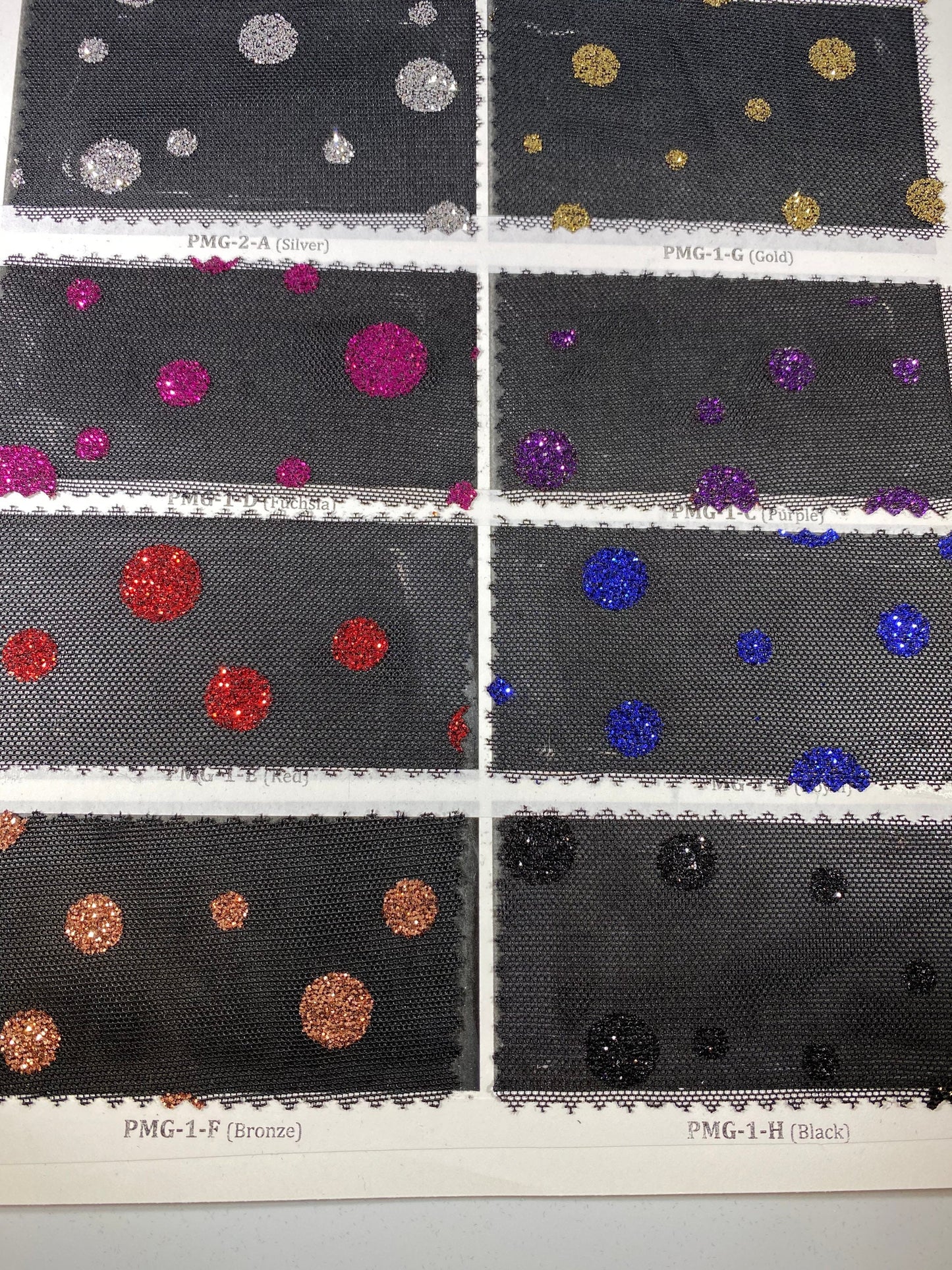 New Glitter polka dots design on black power mesh 2-way stretch 58/60” Sold by the YD. Ships Worldwide from Los Angeles California USA.