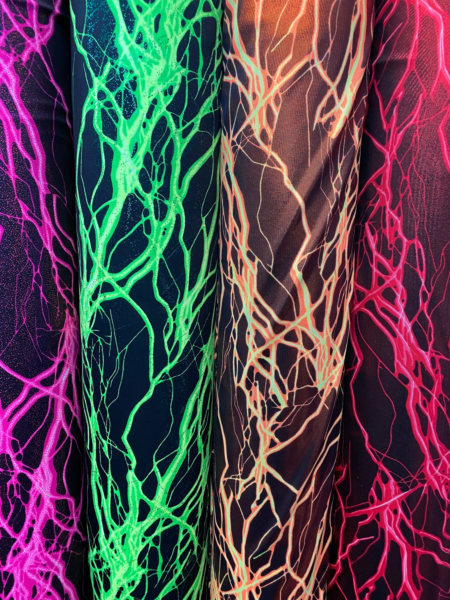 Thunder design print on great quality of nylon spandex with foggy foil 4-way spandex 4-way stretch 58/60” Sold by the YD. Ships worldwide