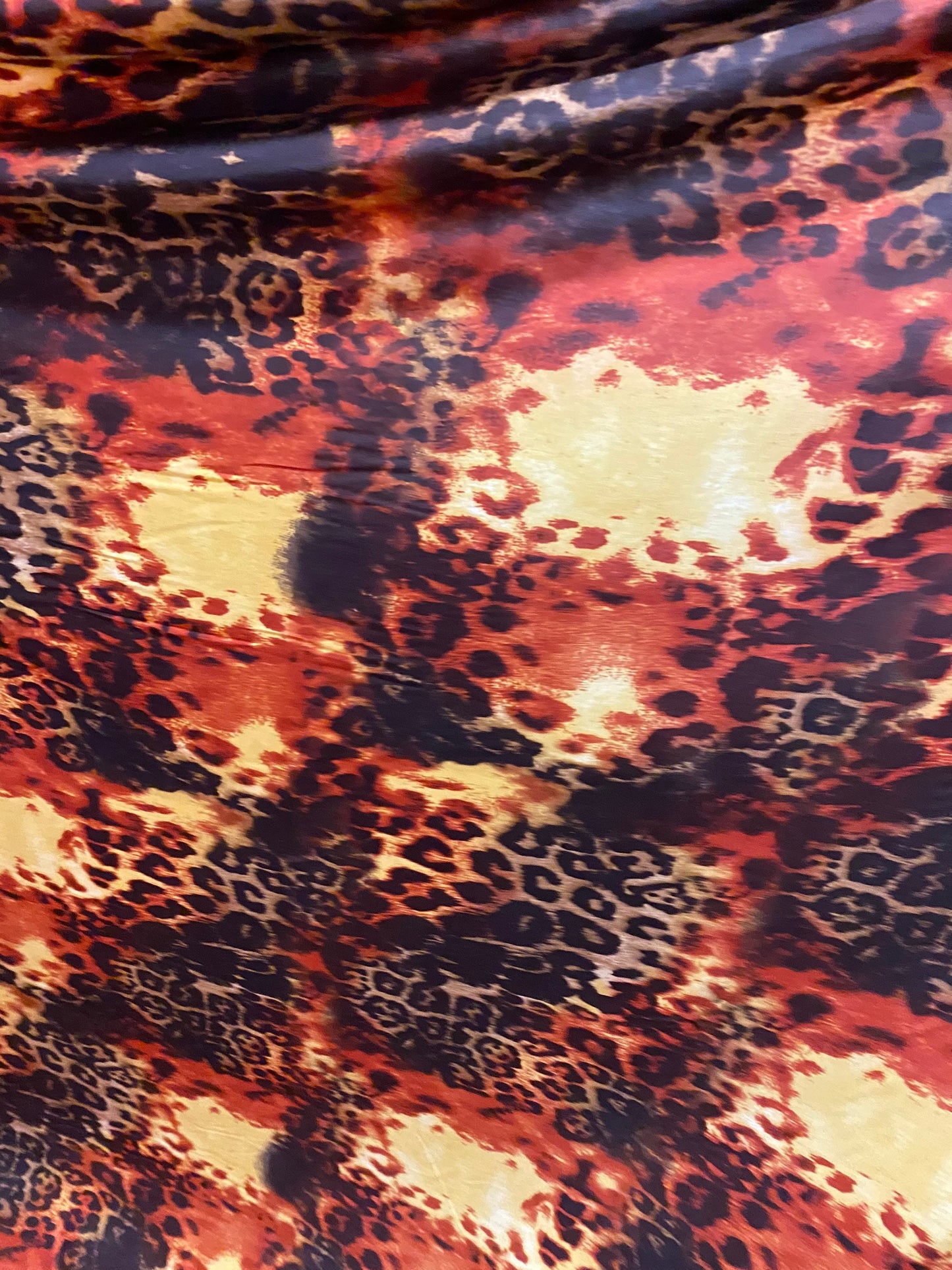 New exotic leopard Animal patch design print on poly spandex medium weight 4-way stretch 58/60” Sold by the YD. Ships Worldwide from LA CA.