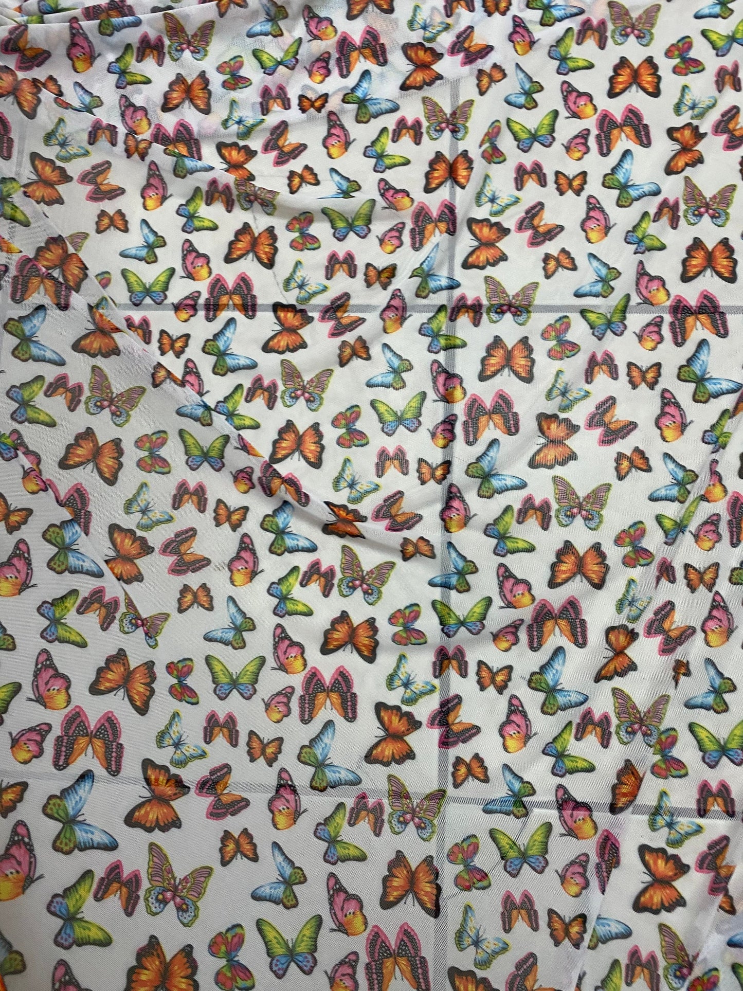 New butterflies design multicolor print on good quality stretch power mesh 4-way stretch 58/60” Sold by the YD. Ships worldwide from Los Ang