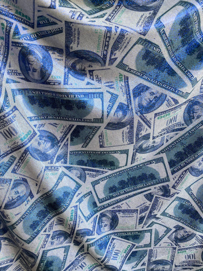 New metallic money design 100 dollar bill hologram sapphire/green print on 4-way spandex with foggy foil all over 58/60” Sold by the YD.