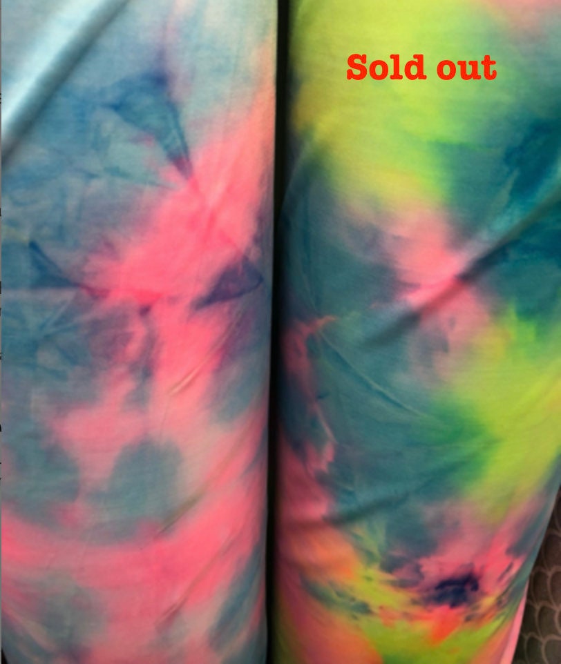 New print tie dye Stretch nylon spandex 4way Stretch 58/60" Sold by the YD. Ships worldwide from Los Angeles California USA