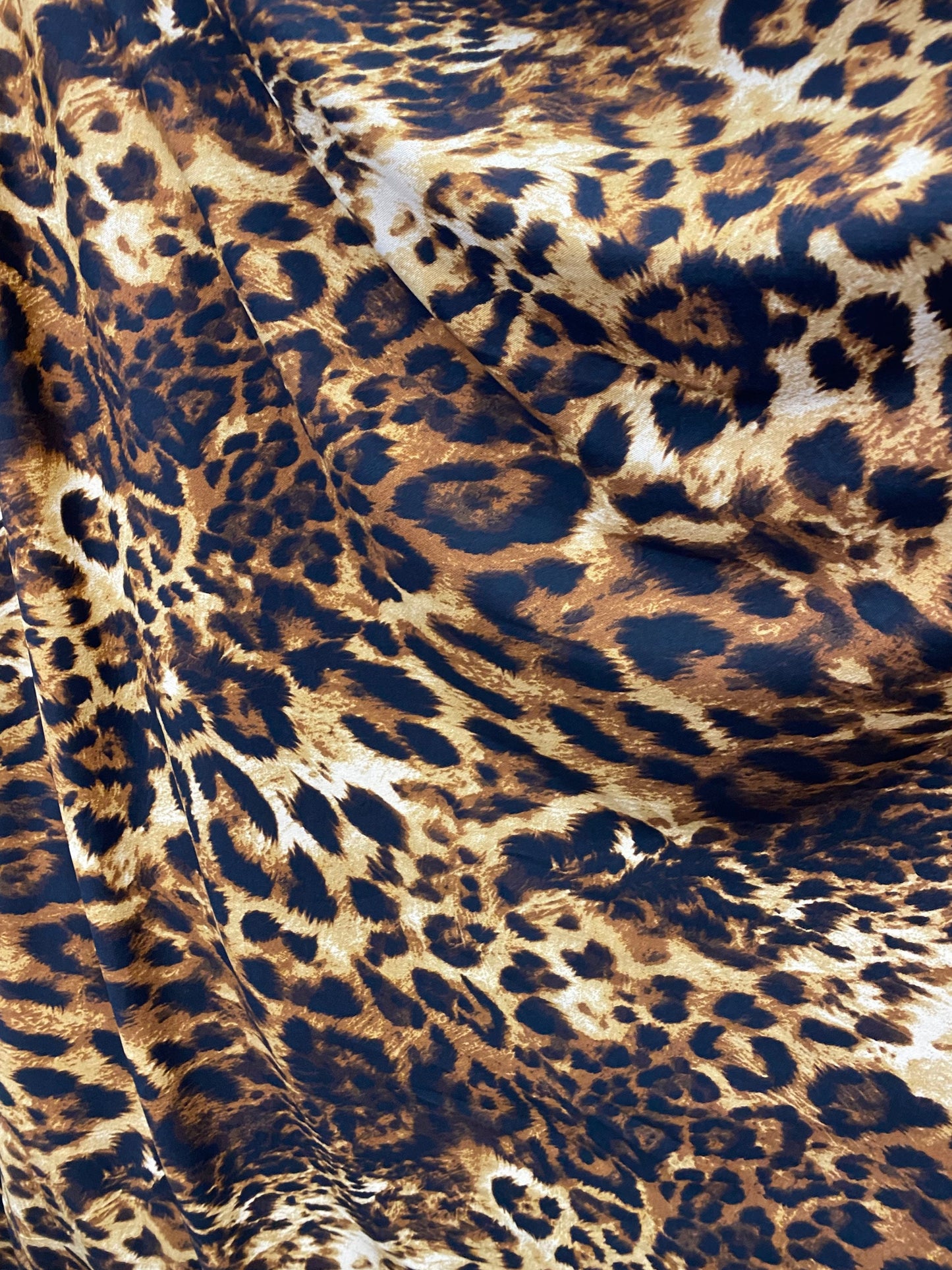 Exotic Leopard design print on great quality of poly spandex 4-way stretch 58/60” Sold by the YD. Ships Worldwide from Los Angeles californi