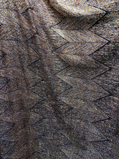 New geometric zigzag design metallic poly spandex bronze color medium weight 4-way stretch 58/60” Sold by the YD. Ships Worldwide from L.A
