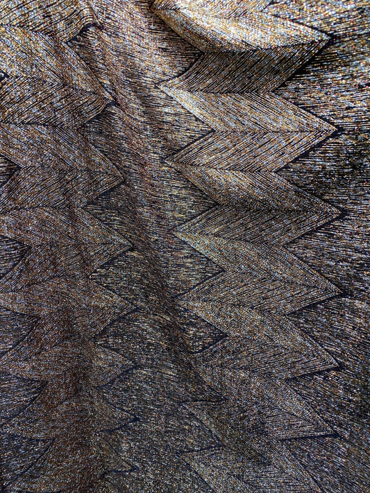 New geometric zigzag design metallic poly spandex bronze color medium weight 4-way stretch 58/60” Sold by the YD. Ships Worldwide from L.A
